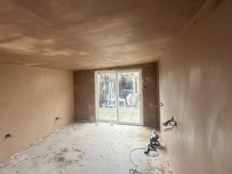 The same extension after skimming, walls and ceiling in fresh plaster